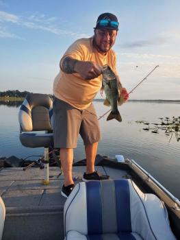 Florida Bass Fishing Guide Joe with his first bass ever.